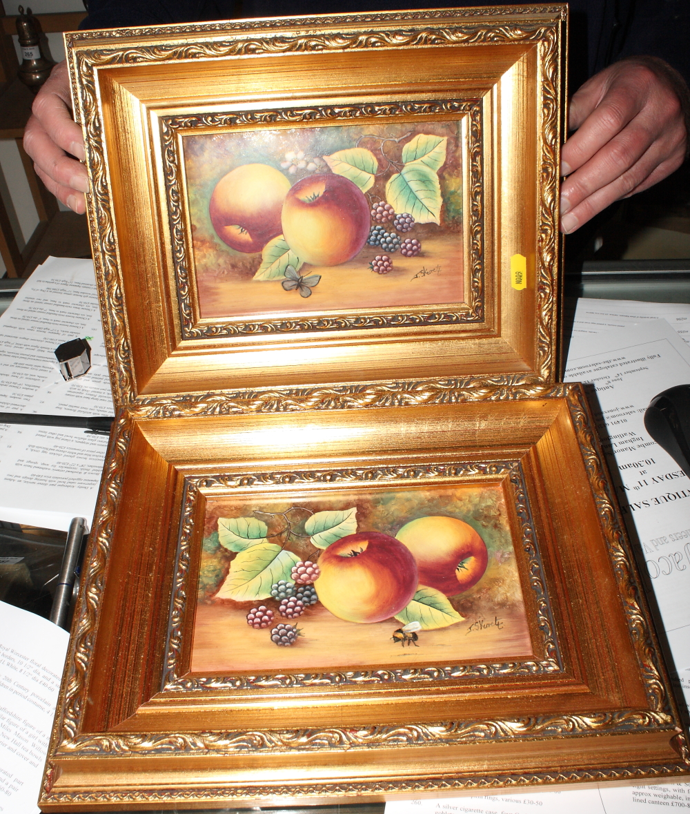 Two Indonesian ceramic plaques with fruit decoration, signed J Skerrett, 5" x 7 1/2", in gilt