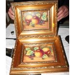 Two Indonesian ceramic plaques with fruit decoration, signed J Skerrett, 5" x 7 1/2", in gilt