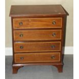 A Georgian design mahogany and satinwood banded chest of four drawers, on bracket supports, 25"