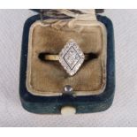 An 18ct gold, platinum and diamond set dress ring