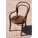 A child's early 20th Century bentwood elbow chair