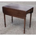 A 19th Century mahogany Pembroke table, on turned supports (damages)