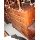 A Victorian mahogany chest of two short and three long drawers with wooden knobs, 47" wide