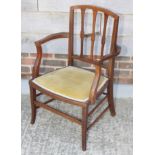 An Edwardian inlaid mahogany salon armchair, seat panel upholstered in a gold velour