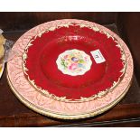 Two Royal Worcester floral decorated cabinet plates with gilt borders, 10 1/2" dia, and a smaller