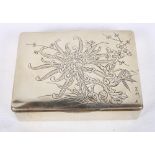 A Japanese rosewood lined white metal box with chrysanthemum and prunus decoration