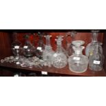 Ten decanters, various, and assorted stoppers, a large glass goblet with knopped stem and crystal