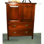 A polished as mahogany cupboard enclosed two doors, fitted two drawers below, 36" wide