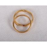 Two 22ct gold wedding bands, 6.9g