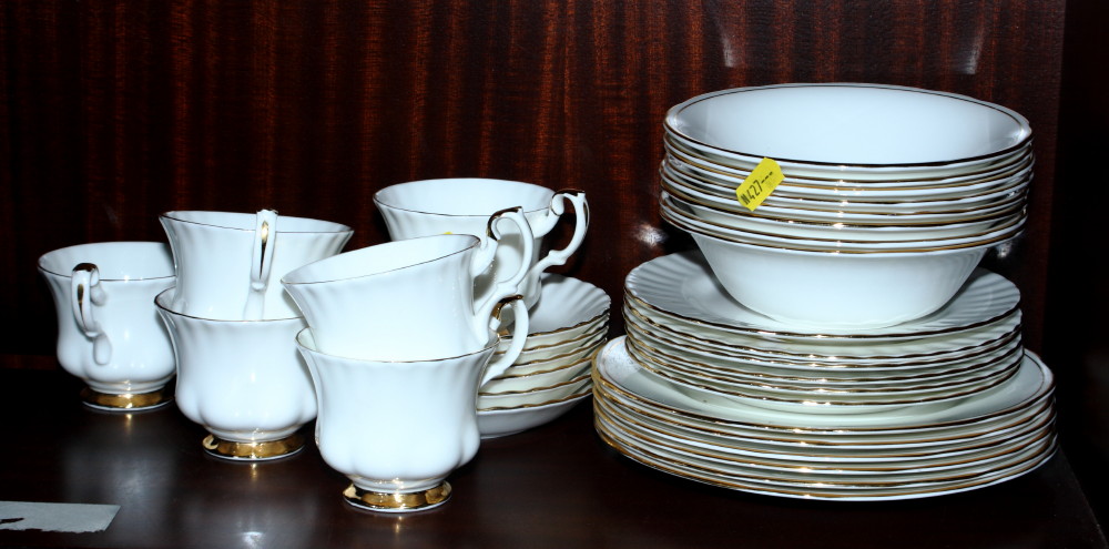 A Royal Albert bone china "Val D'Or" part combination service, a bone china "Nippon" part teaset and