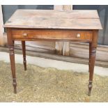 A mahogany side table, fitted one drawer, on turned supports, 33" wide