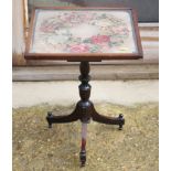 An Edwardian occasional table with needlepoint top, on tripod splay supports, 14" square