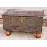 An antique "Zanzibar" hardwood and brass mounted chest, fitted three drawers, on later