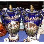 A pair of 19th Century two-handled Sevres style vases with figured decoration, 13" high (now