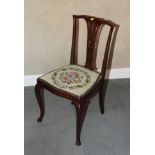 A pair of early 20th Century wooden occasional chairs with fretted splats and tapestry seats and a