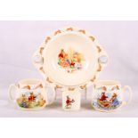 A Royal Doulton Bunnykins hot water dish, two mugs and a cup