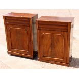 A pair of mahogany bedside cabinets, 24" wide