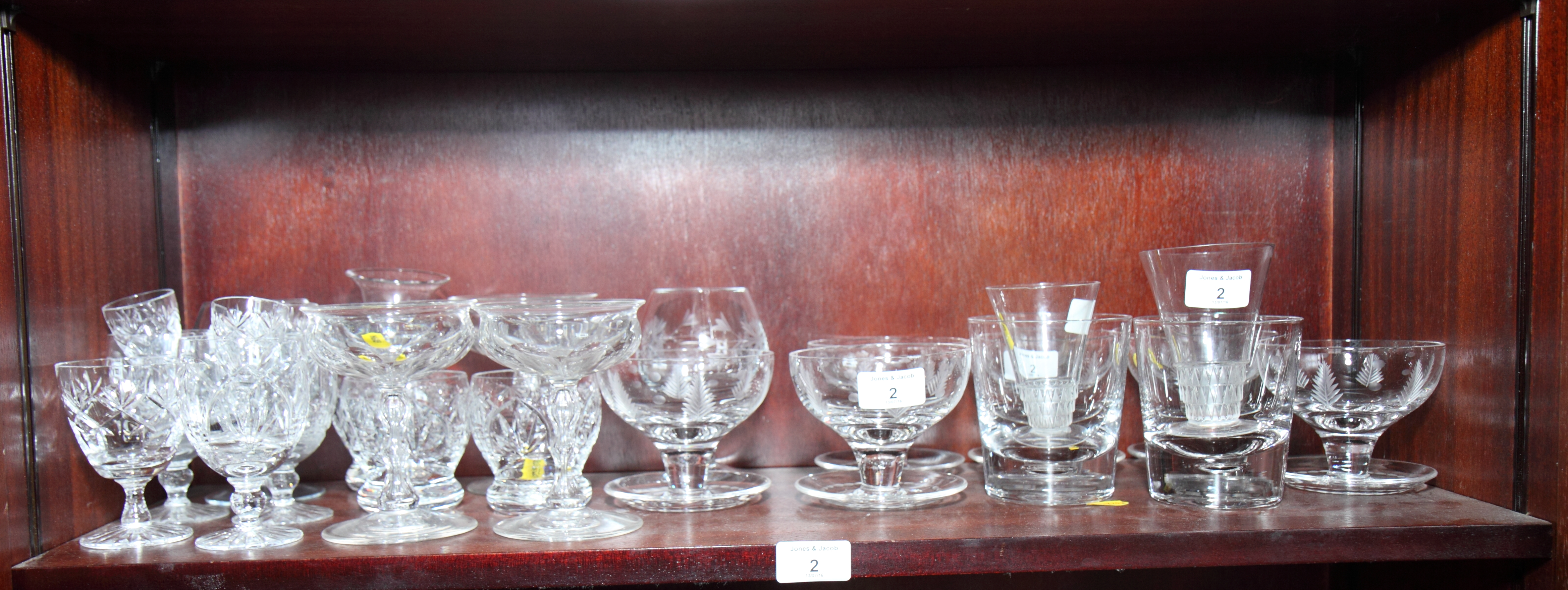 A set of Stuart crystal sundae glasses, two Lalique glasses with conical bowls and a number of other