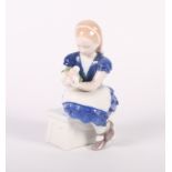 A Bing & Grondal figure of a seated girl with a bunch of tulips and an oriental figure of two