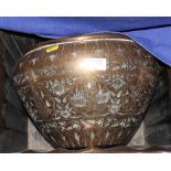 An Indian brass bowl, sides engraved flowers and panels of figures, 12" dia