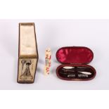 A 19th Century burr yew and box line inlaid etui case containing scissors, bodkin needle and