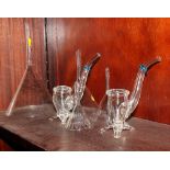 A pair of 19th Century glass cordial pipes and four glass funnels