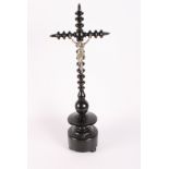 A 19th Century Flemish ebonised turned wood cross with white metal Christ figure, 20" high