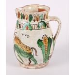 A black and gilt decorated cow creamer, an Art Pottery bowl decorated a fish and other items of