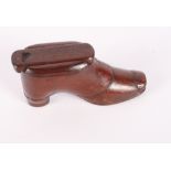 A 19th Century treen shoe snuff box, 4 1/4" long