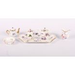 A doll's Hammersley cabaret set for one decorated violets and other items of dolls' tea wares