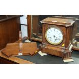 An early 20th Century oak cased mantel clock with white enamel dial inscribed Webster London, French