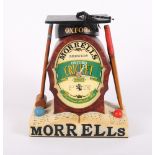 A Morrells Brewery "Oxford Cricket" novelty mantel clock with quartz movement