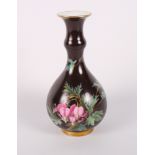 A Meissen bottle-shaped vase decorated flowers on a brown ground