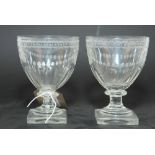 A pair of 19th Century glass rummers, bowls engraved swags, on square bases