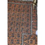 A Turkish prayer rug decorated rectangular trellis ground and matching border, 56" x 40" approx, and