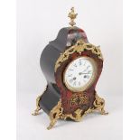 A tortoiseshell and brass boulle work mantel clock of Louis XVI design, eight-day striking movement,