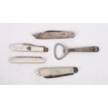 Two pearl handled folding fruit knives, a similar fork, a bottle opener and a silver penknife, sides