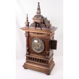 A late 19th Century Black Forest cuckoo clock in architectural design case with double fusee