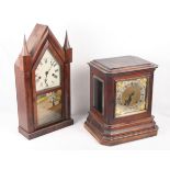 A 19th Century oak cased mantel clock with brass dial and eight-day striking movement, 13 1/2" high,