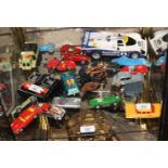 A collection of thirteen die cast model cars, mostly racing, and a number of other similar toys