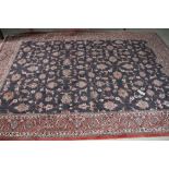 A Bidjar carpet decorated palmettes on a dark blue ground, 120" x 81" approx