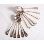 A set of six Old English pattern silver tablespoons and six matching dessert spoons engraved "J