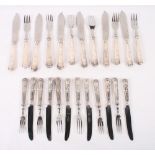 A set of six silver handled King's pattern fish knives and forks and a matching set of silver