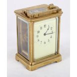 A brass cased carriage clock, 5" high