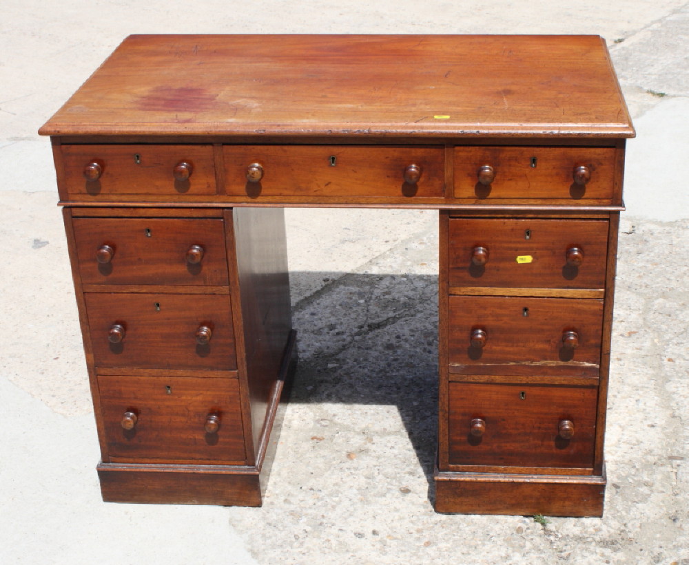 An early 20th Century mahogany twin pedestal desk, 38" wide