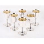 A set of six silver and parcel gilt goblets on circular feet, 36.8oz troy approx