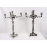 A pair of 19th Century Elkington silver plated three-branch candelabra, the tapering stems decorated