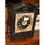 A late 19th Century slate and marble mantel clock with eight-day striking movement, 12" high