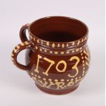 A studio pottery "Wrotham" type two-handled mug, 6 1/2" high