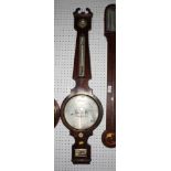 Freemasonry: a 19th Century wheel barometer in mahogany case, scroll pediment, silvered dial